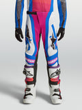 Alpinestars Jeugd Supertech Maven broek, witte motocross-broek met roze en blauw, stretchpasvorm voor off-road racing.