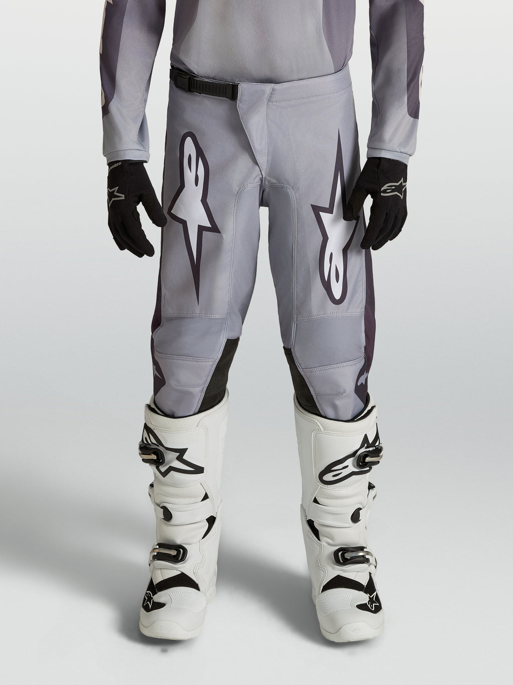 Alpinestars Pantalon Fluid Amber Junior, pantalon de motocross gris et noir pour enfant, en polyfibre 600D durable.