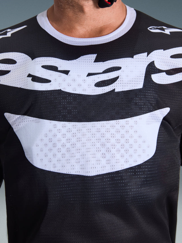 Alpinestars 2026 Racer Air Riway Jersey, Motocross Jersey, Black and White, close-up of chest showing large white graphic and breathable mesh construction, white collar and shoulder logos