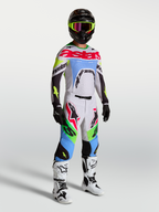 Alpinestars 2027 Supertech Dyna jersey en gear set, heren-motocrossoutfit, licht lila en groen fluo, atletische racepasvorm.