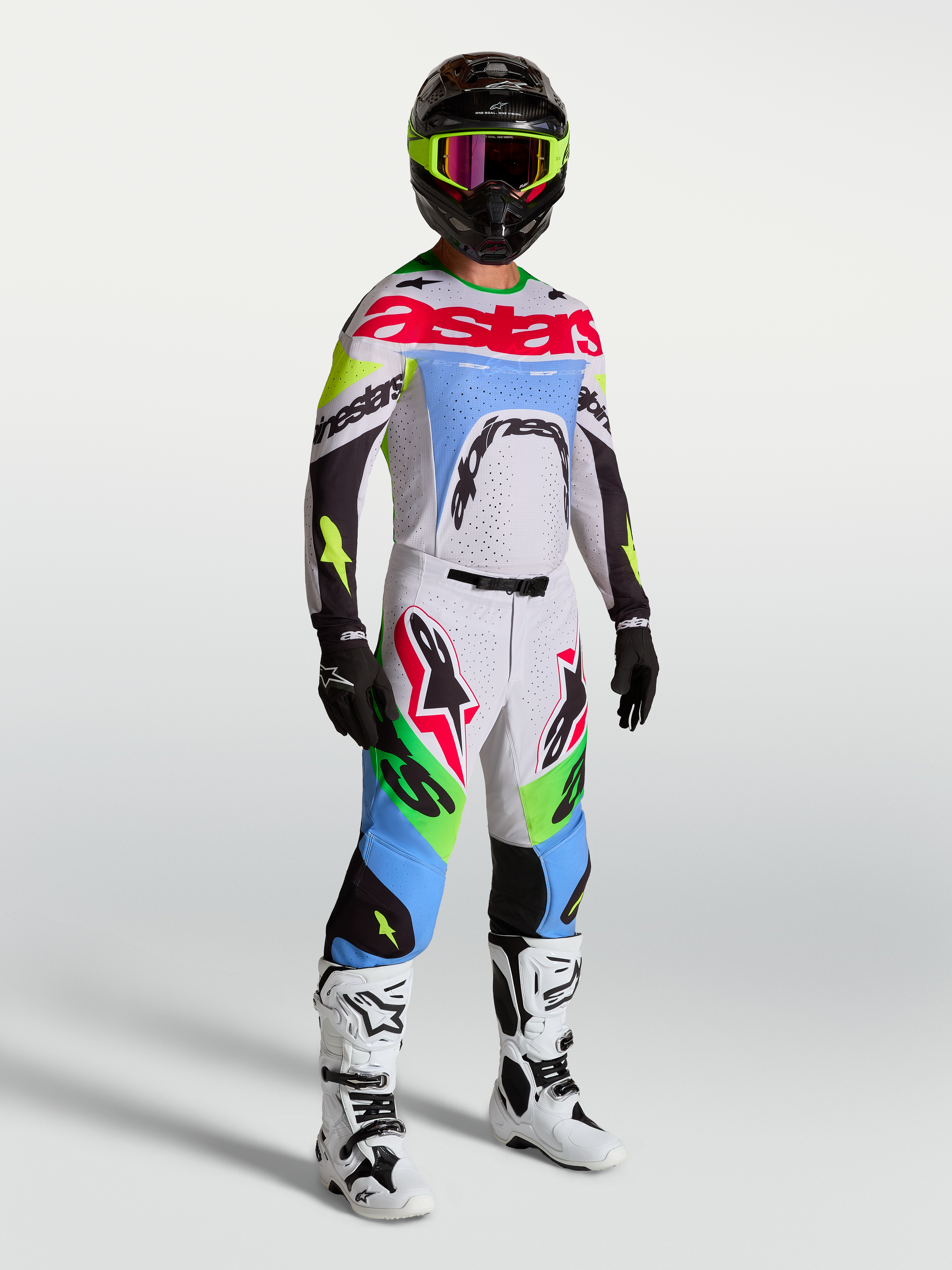 Alpinestars 2027 Supertech Dyna jersey en gear set, heren-motocrossoutfit, licht lila en groen fluo, atletische racepasvorm.