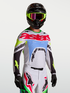 Alpinestars Supertech Dyna heren-motorcrossjersey, licht lila en fluorgroen, stretch mesh met lasergesneden ventilatie.