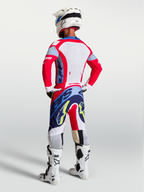 Alpinestars Supertech Dyna jersey, heren-motorcrossuitrusting in rood en blauw met lasergesneden rugpanelen.