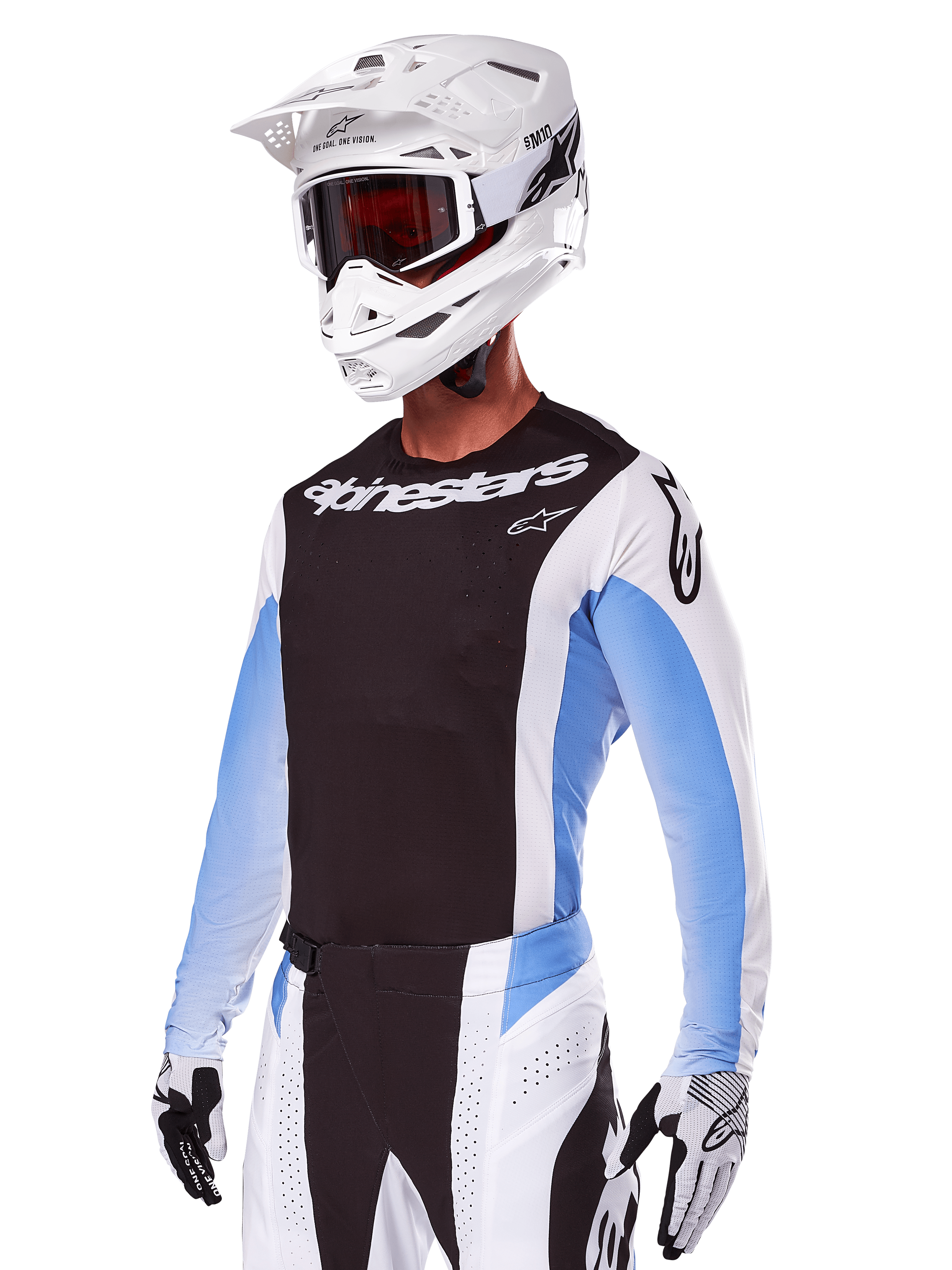 Motocross rider wearing Alpinestars 2025 Techstar Melt Gear Set, White with black and light blue accents, featuring a jersey with a black chest and white sleeves, matching white and black pants, white SM10 helmet with goggles, and black and white gloves, complete professional off-road racing outfit.