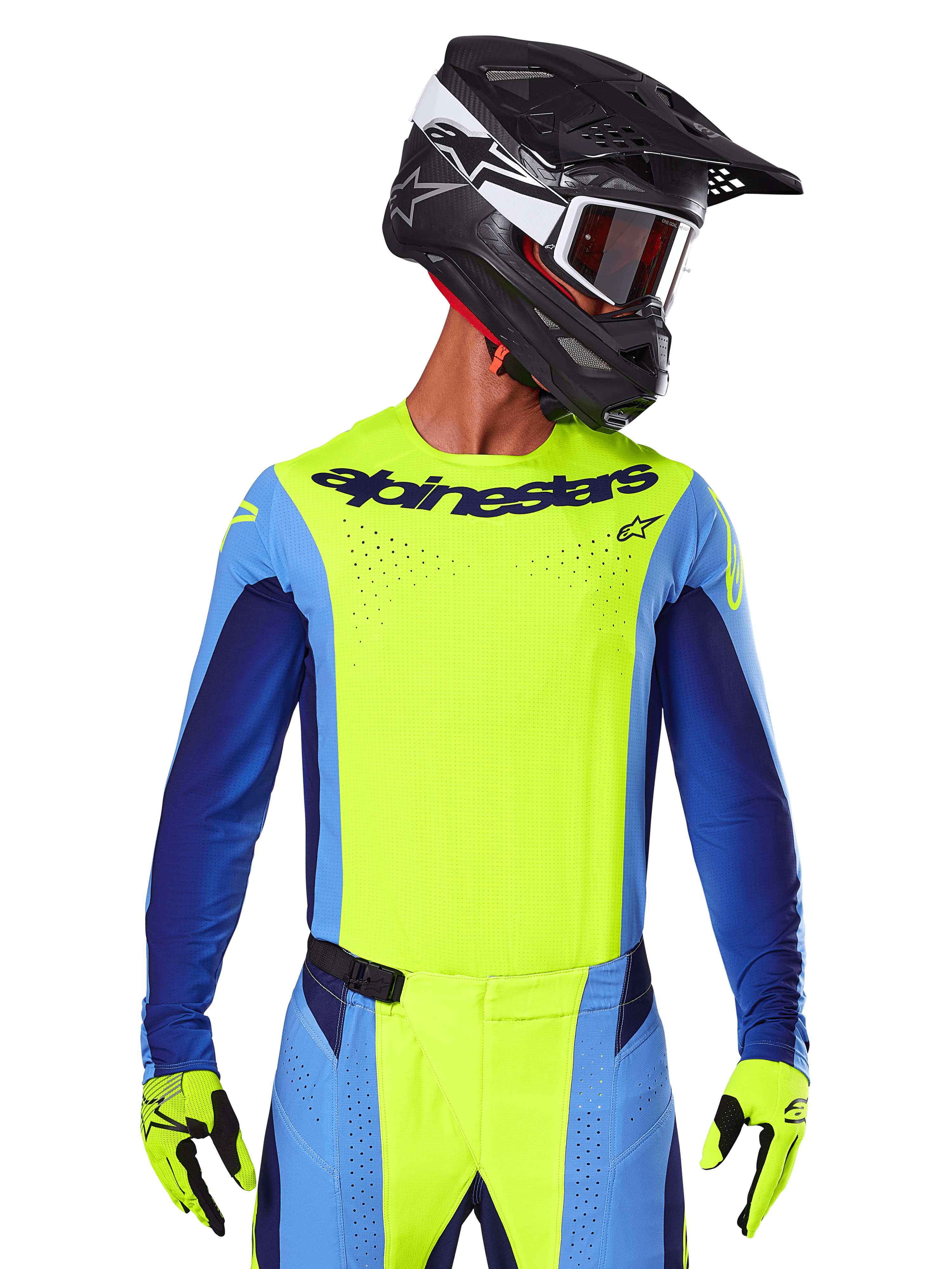 Alpinestars 2025 Techstar Melt Jersey, motorcross racetenue, fluogeel en blauw, voorzien van laser-gesneden ventilatie en een atletische racepasvorm, gedragen door een rijder met een zwarte helm en fluogele handschoenen