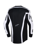 Alpinestars 2026 Racer Riway Jersey, Motocross Jersey, White and Black, Rear view showing black chassis with white vertical stripes and sleeve panels, Astars logo in the center back, 'astars' text on sleeves, extended rear cut for off-road riding coverage