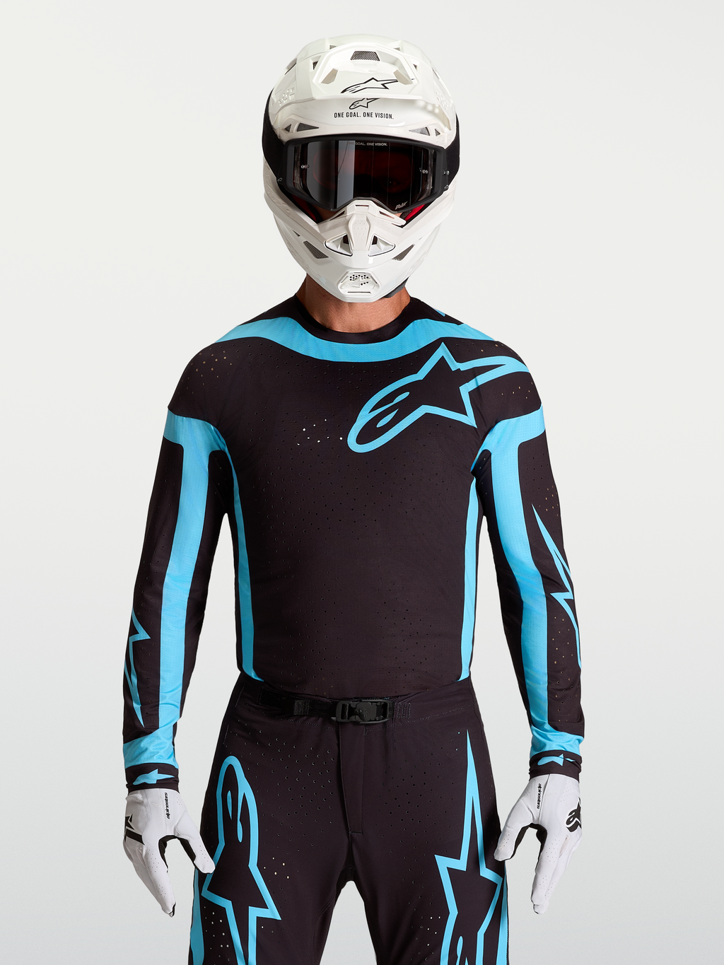 Alpinestars Supertech Vesta jersey, zwart en turquoise motocrossjersey voor heren met ademende lasergesneden ventilatie.