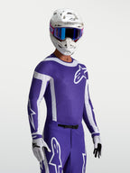 Alpinestars Supertech Vesta jersey, motocrossjersey voor heren, blauw en wit, atletische racepasvorm met lasergesneden ventilatie.