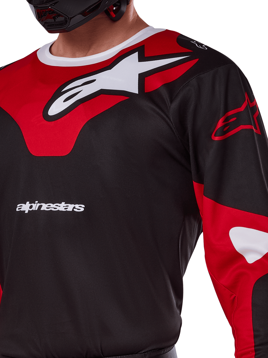 Alpinestars 2025 Racer Veil Jersey, motocross jersey, zwart en felrood, close-up met een groot wit Astars-logo op een rood borstpaneel, witte merktekst en technische vochtafvoerende stof.