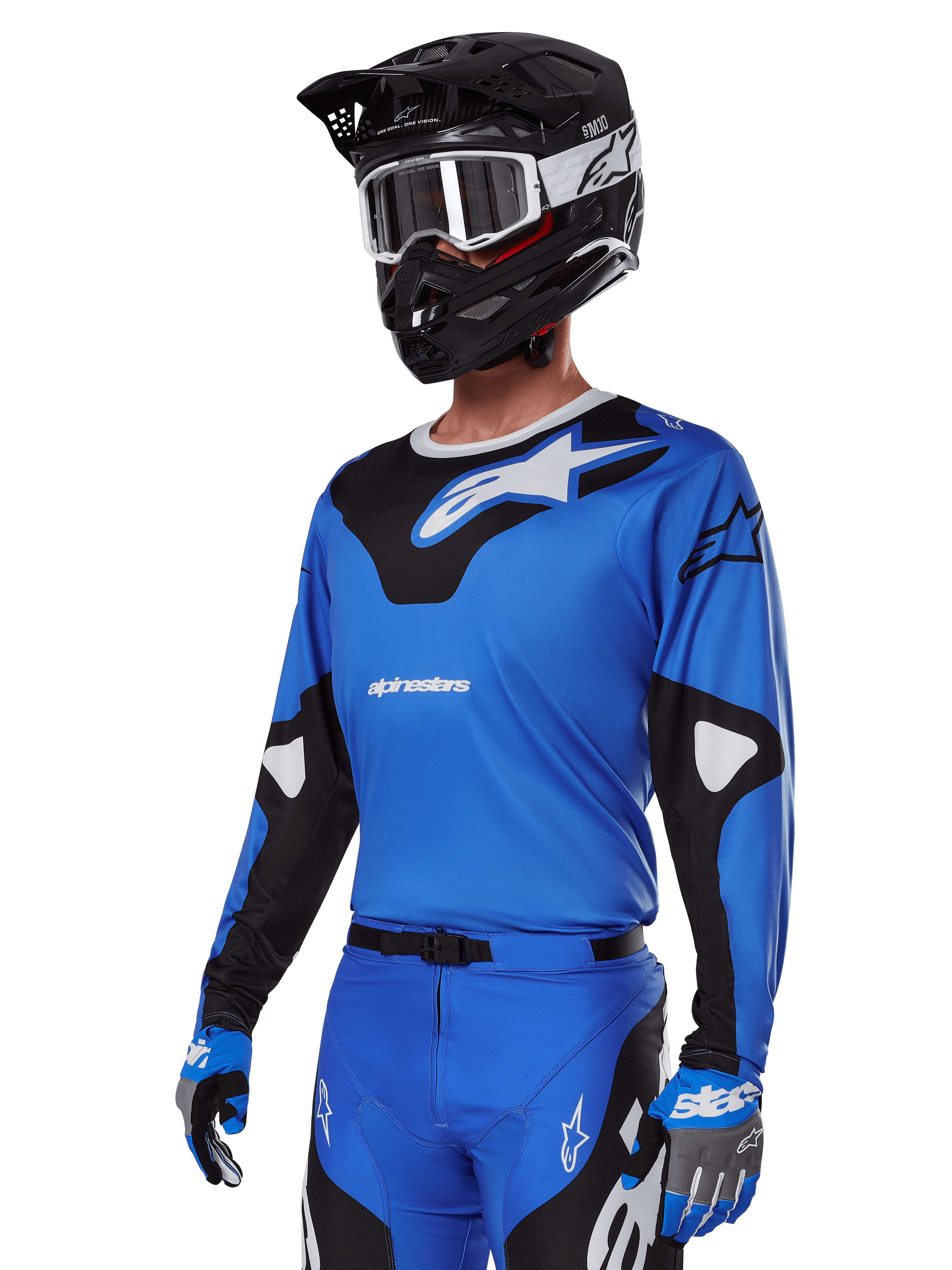 Alpinestars 2025 Racer Veil Gear Set, blauwe motorcross jersey met zwart-witte graphics, gedragen met bijpassende broek, zwarte helm, witte crossbril en blauwe handschoenen, technische kleding voor off-road racen