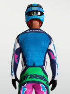 Alpinestars Techstar Maven Jersey, motocrossracing jersey voor heren, blauw en groen met roze accenten, lasergesneden ventilatie.