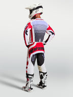 Alpinestars Techstar Maven Jersey, heren motorcrossgear, rood-wit, achteraanzicht, atletische pasvorm en lavendel accenten.