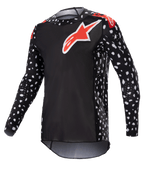 Alpinestars 2023 Supertech North Jersey, motocross shirt, zwart en neonrood, lange mouwen met wit spikkelpatroon, rood-witte sterlogo's op borst en schouders, lichtgewicht performance mesh met atletische race-pasvorm