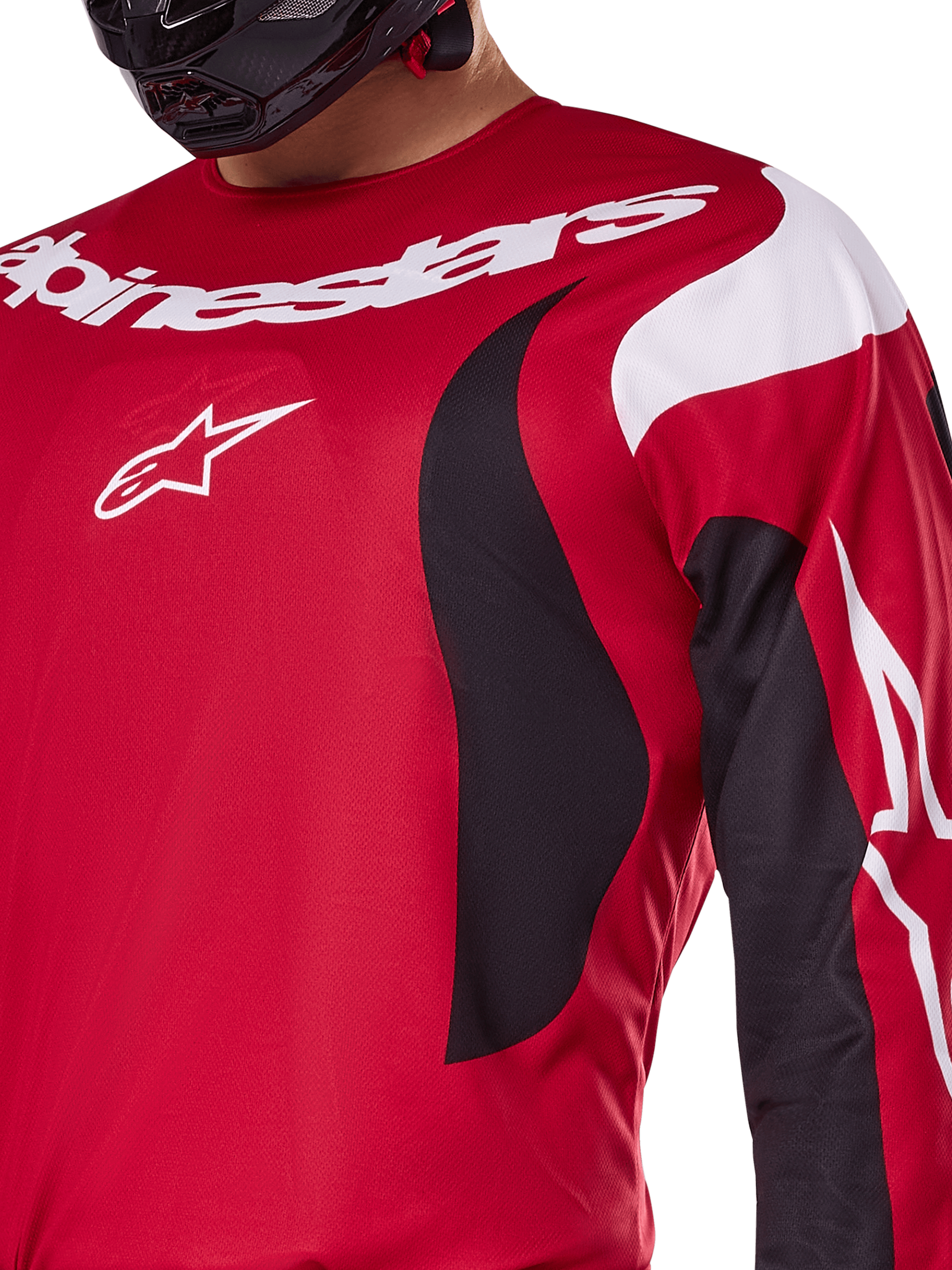 Alpinestars 2025 Fluid Haul Trikot, leuchtendes Rot und Schwarz, Nahaufnahme der Brust und des Arms mit weißem Alpinestars-Branding und Logo, sportliches ergonomisches Design mit geschwungenen Akzenten für Motocross-Performance.