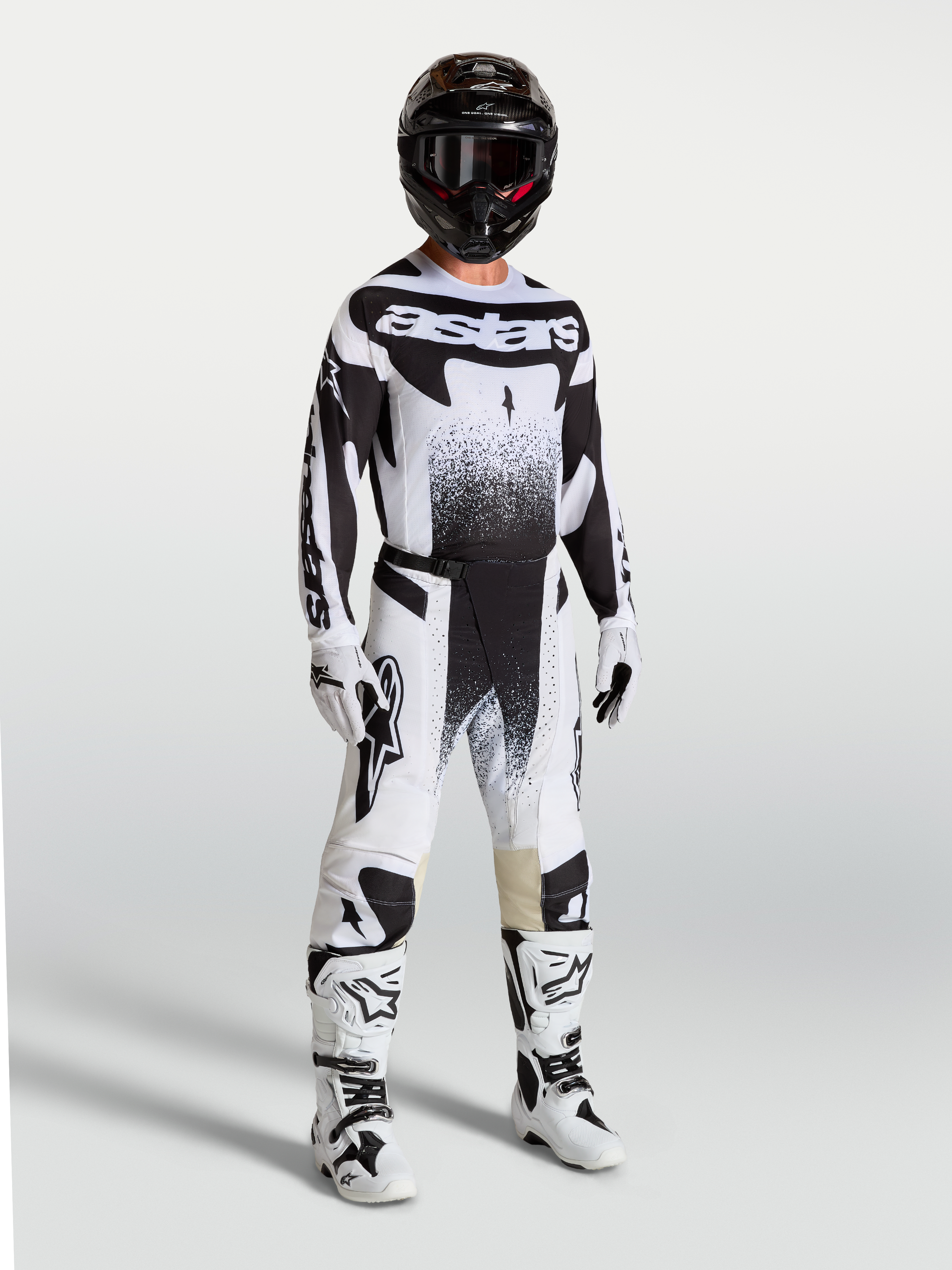 Alpinestars Techstar Swan Trikot und Gear Set, Herren-Motocross-Outfit in Schwarz und Weiß mit Performance-Grafiken.