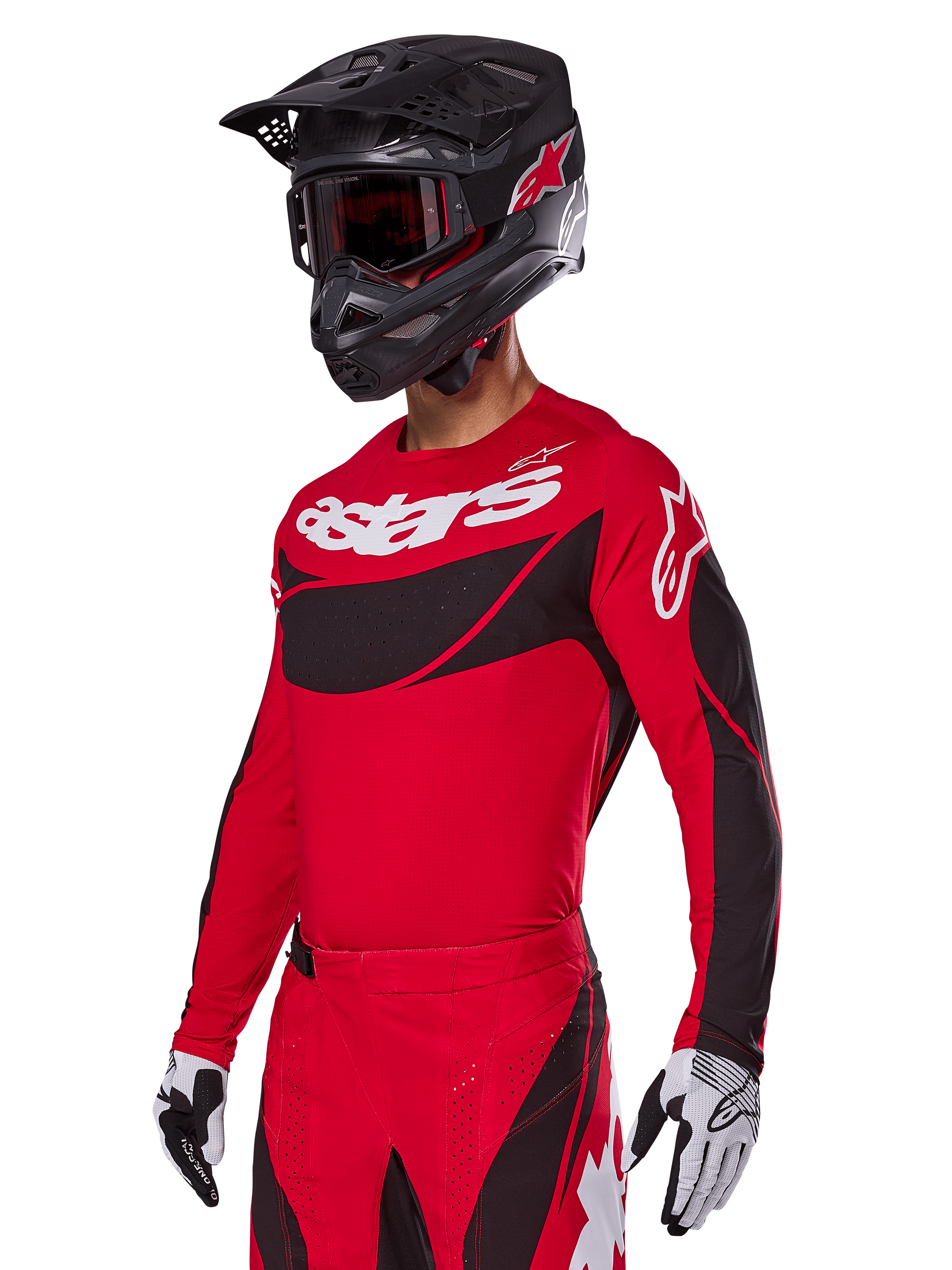 Alpinestars 2025 Techstar Dreem Gear Set, rotes Motocross-Trikot und Hose mit schwarzen und weißen Akzenten, getragen mit schwarzem Helm und Goggles, weiße und schwarze Handschuhe, markantes „astars“-Branding, konzipiert für Performance-Offroad-Rennsport