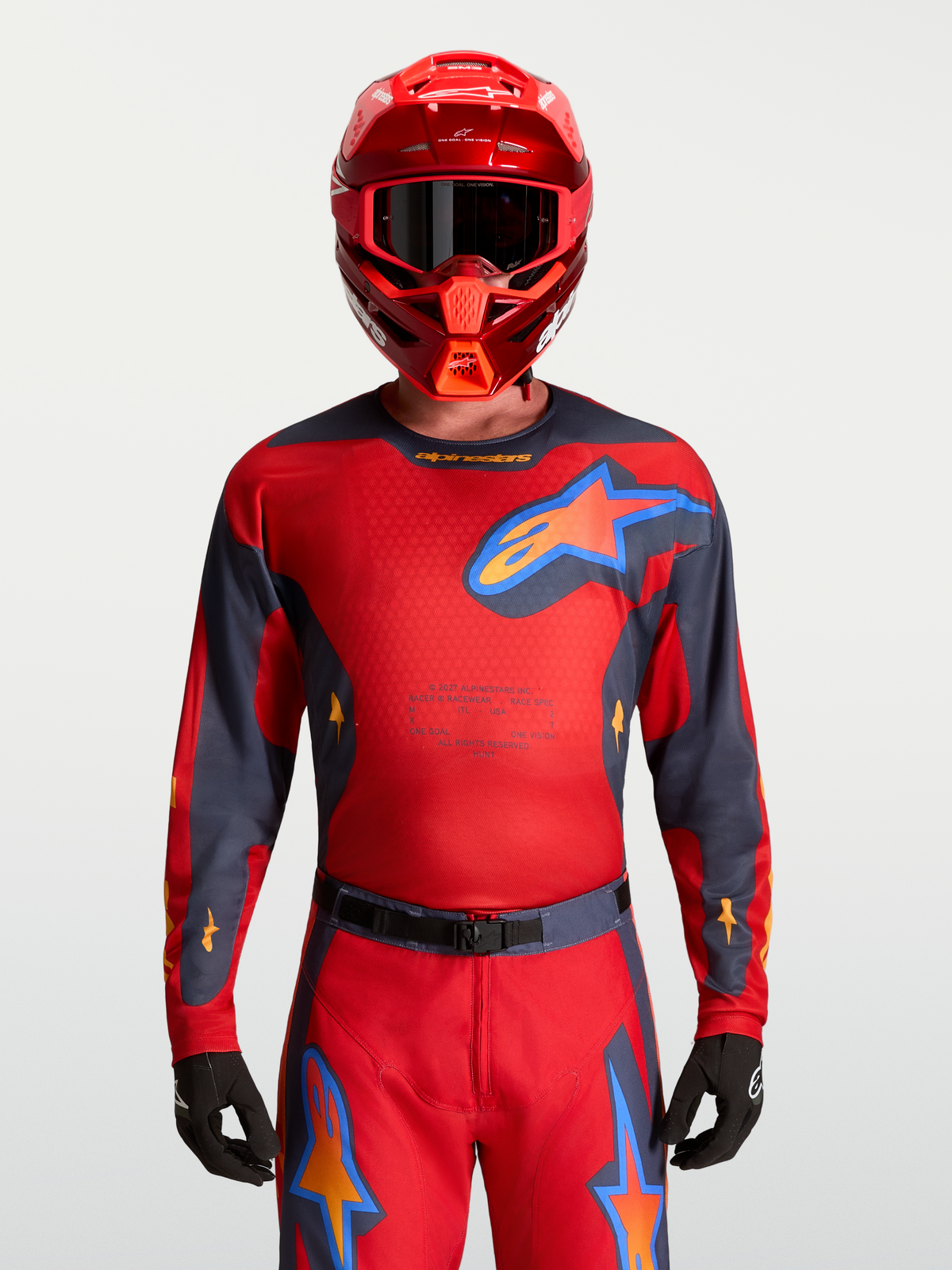 Alpinestars Maillot Racer Hunt, maillot de motocross pour homme rouge et gris, tissu évacuant l'humidité et maille ventilée.