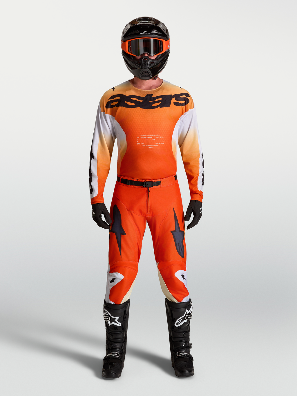 Alpinestars Racer Amber jersey en Racer Amber uitrustingsset, motocross-outfit voor heren, oranje en wit, ademende pasvorm.