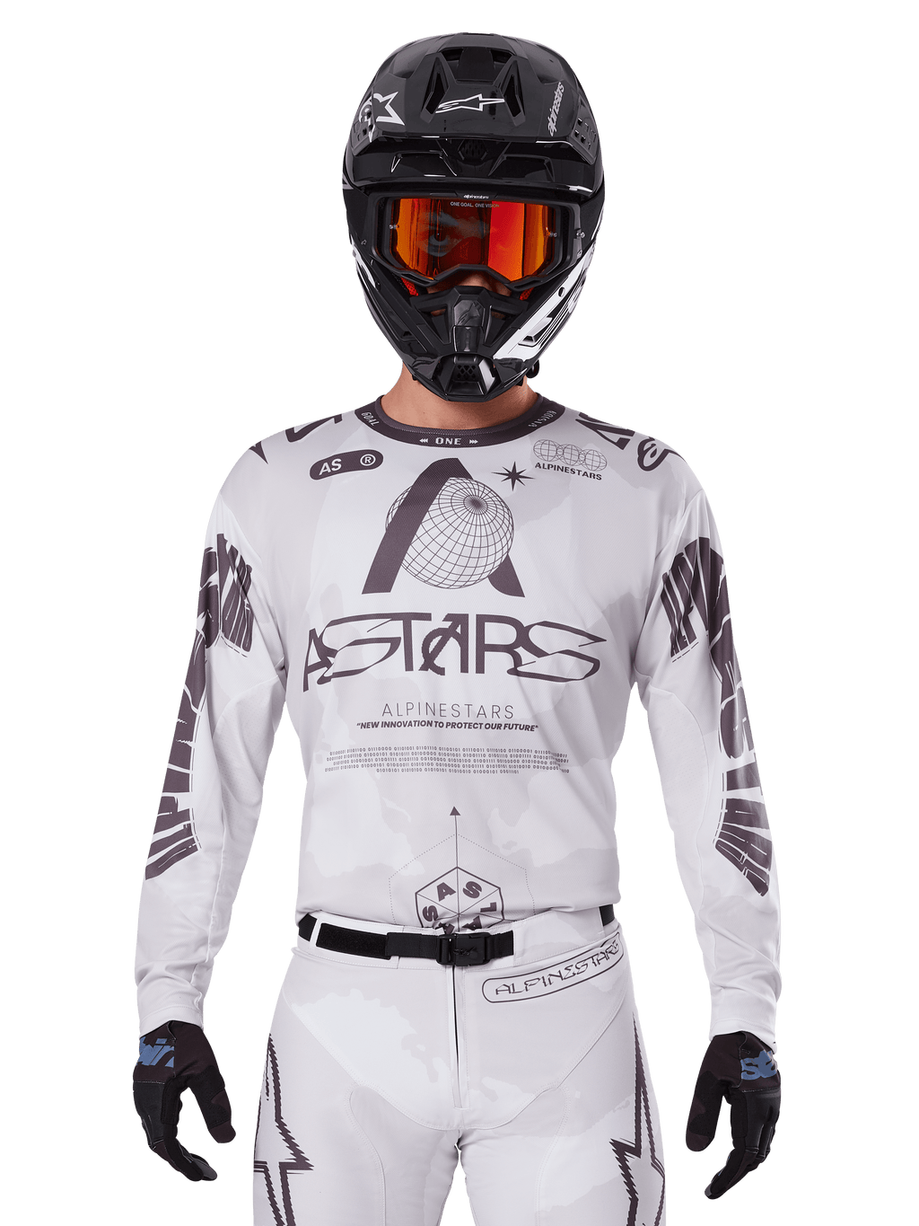 Alpinestars 2025 Racer Hollow Jersey, Motocross Jersey, White and Black, worn with matching white MX pants and a black helmet with orange goggles, featuring bold Alpinestars branding and globe graphics, professional off-road racing gear