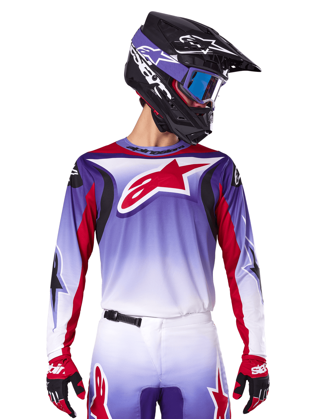 Alpinestars 2025 Fluid Wurx Jersey, motorcrossjersey, paars-wit verloop, rood sterlogo en accenten, atletische pasvorm, gedragen met bijpassende broek, zwarte helm en rode handschoenen