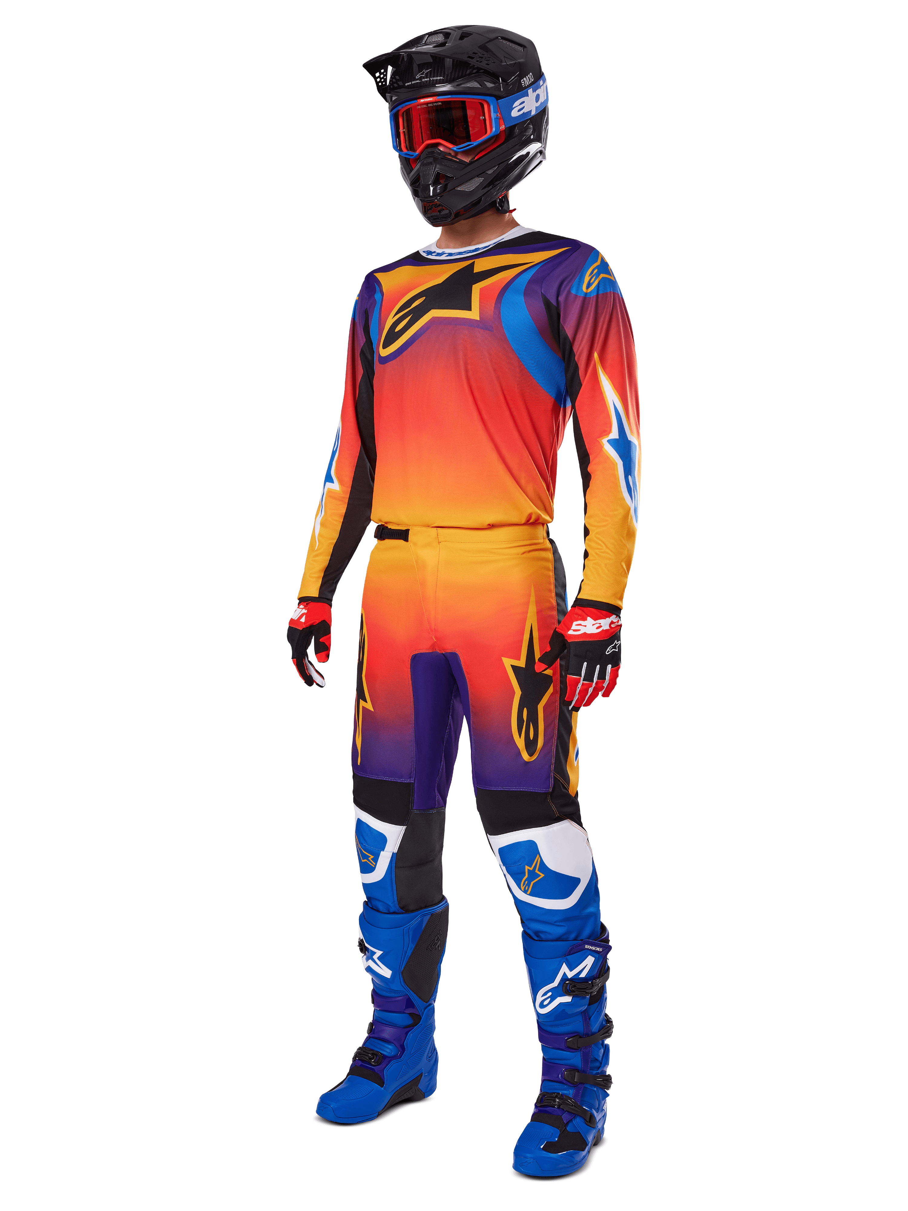 2025 Fluid Wurx Gear Set, Motocross-Jersey und -Hose mit orange-rot-lila Farbverlauf und blau-gelben Sterndesigns, getragen mit schwarzem Helm, roter Brille, rot-schwarzen Handschuhen und blauen Stiefeln, hochsichtbare Rennausrüstung