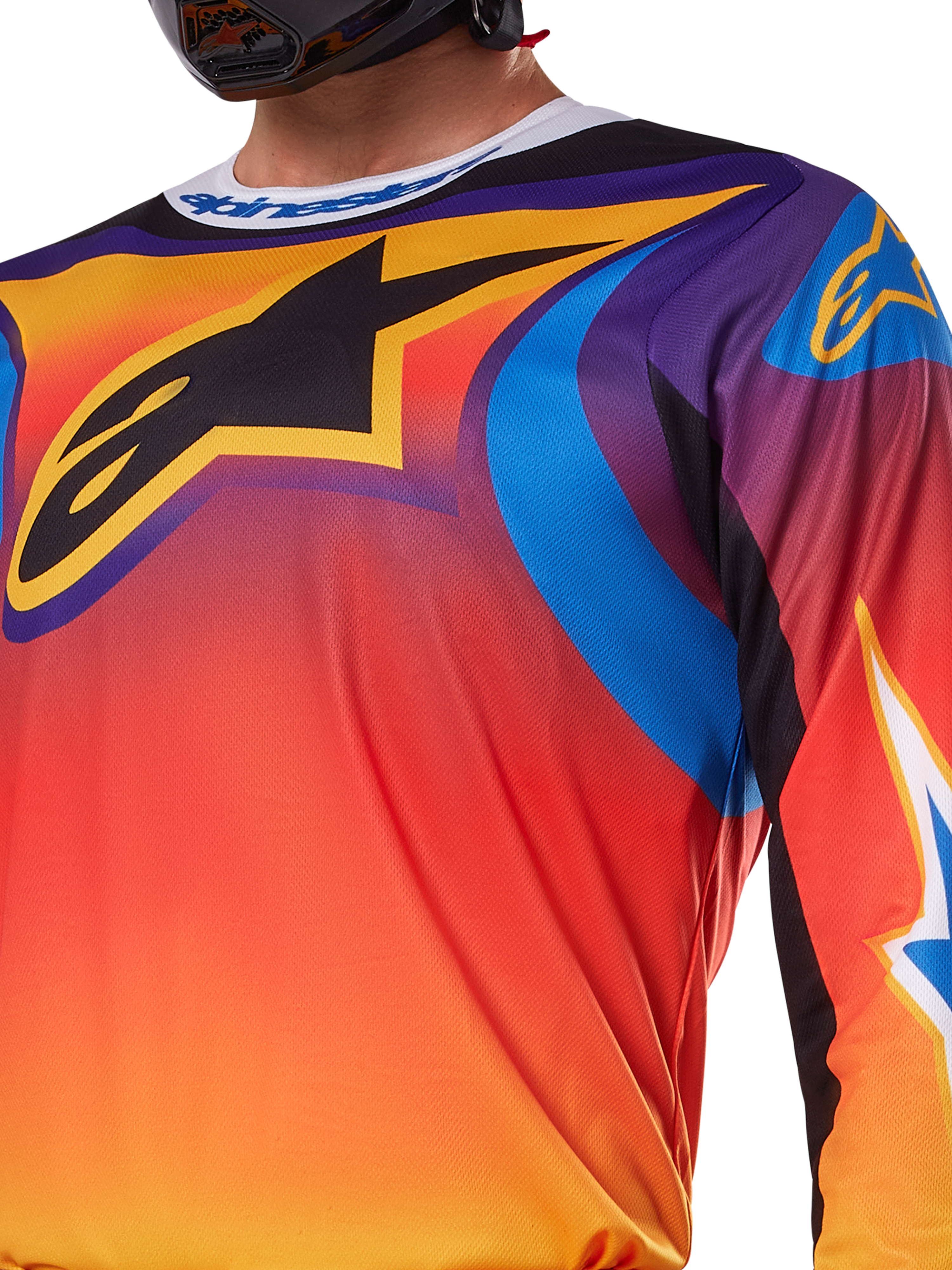 Maillot Alpinestars Fluid Wurx 2025, design multicolore blanc et orange, maillot de motocross à manches longues, coupe athlétique décontractée, tissu en polyester évacuant l'humidité pour la performance tout-terrain