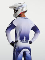 Alpinestars Racer Air Amber Jersey, heren-motorcrossjersey in blauw en wit, achteraanzicht met geventileerde meshconstructie.