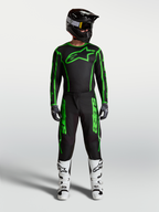 Alpinestars Fluid Apex V2 jersey en gearset, zwarte en fluogroene heren-motocrossoutfit met witte laarzen.