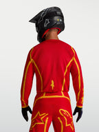 Alpinestars Fluid Apex V2 jersey, ademende heren motocross jersey in rood en goud, achteraanzicht met ergonomische snit.