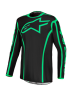 Alpinestars Fluid Apex V2 jersey, zwart en fluogroen motorcrossjersey met vochtafvoerend polyfabric en sterlogo.