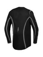 Alpinestars Fluid Apex V2 jersey, heren-motorcrossjersey in zwart en zilver, achteraanzicht met verlengde achterkant voor betere bedekking, ademende polyfabric constructie.