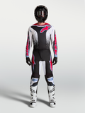 Ensemble Alpinestars Fluid Drag, maillot et pantalon de motocross noir et blanc à graphismes rouges, performance tout-terrain.
