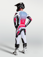 Alpinestars Fluid Drag jersey, heren-motorcrossgear, zwart en fluo rood, ademend textiel, rugaanzicht op model.