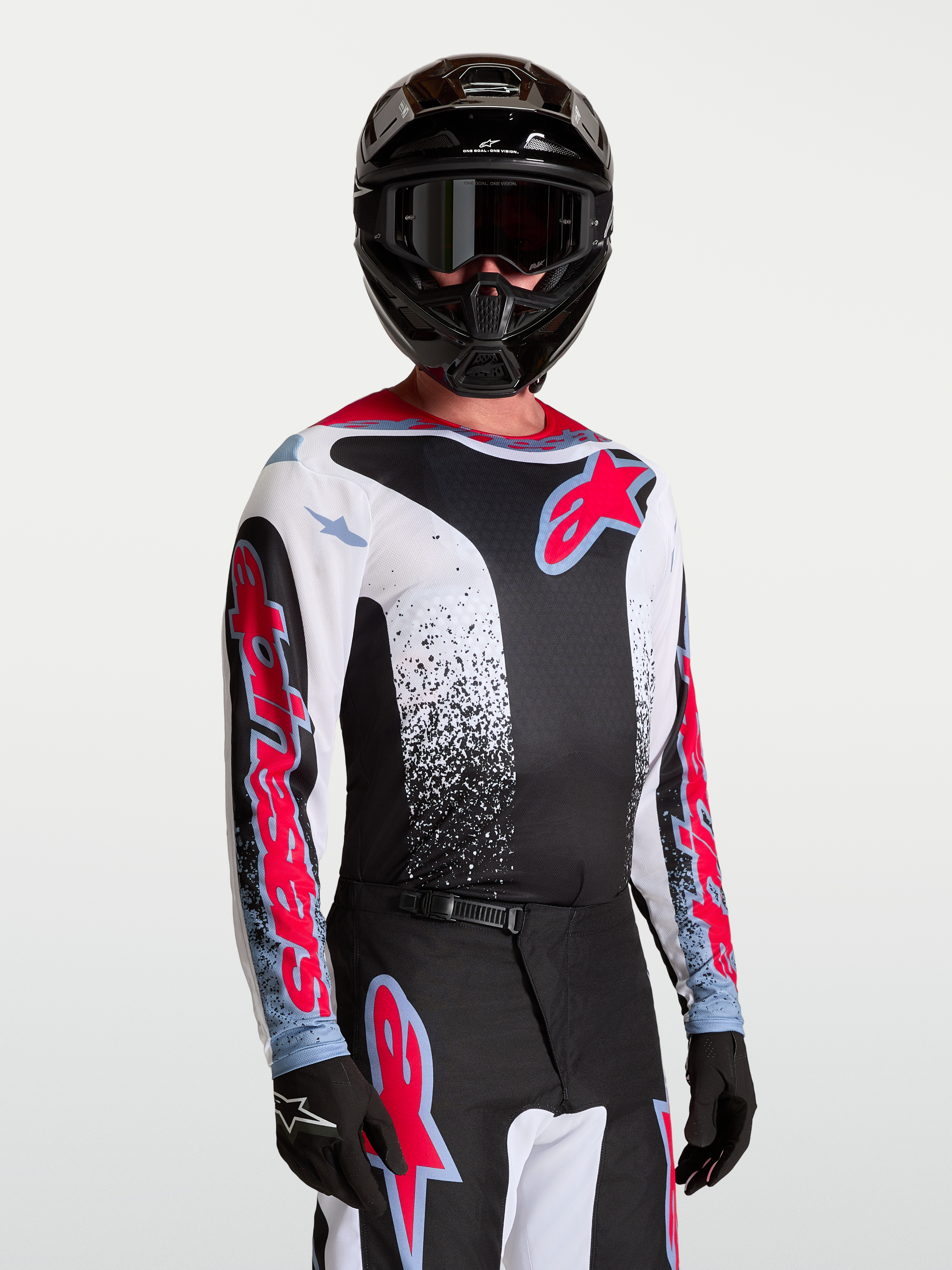 Alpinestars Fluid Drag jersey, heren motorcrossjersey, zwart en wit met rood en blauw, ademend en lichtgewicht polyfabric, ideaal voor off-road rijden.