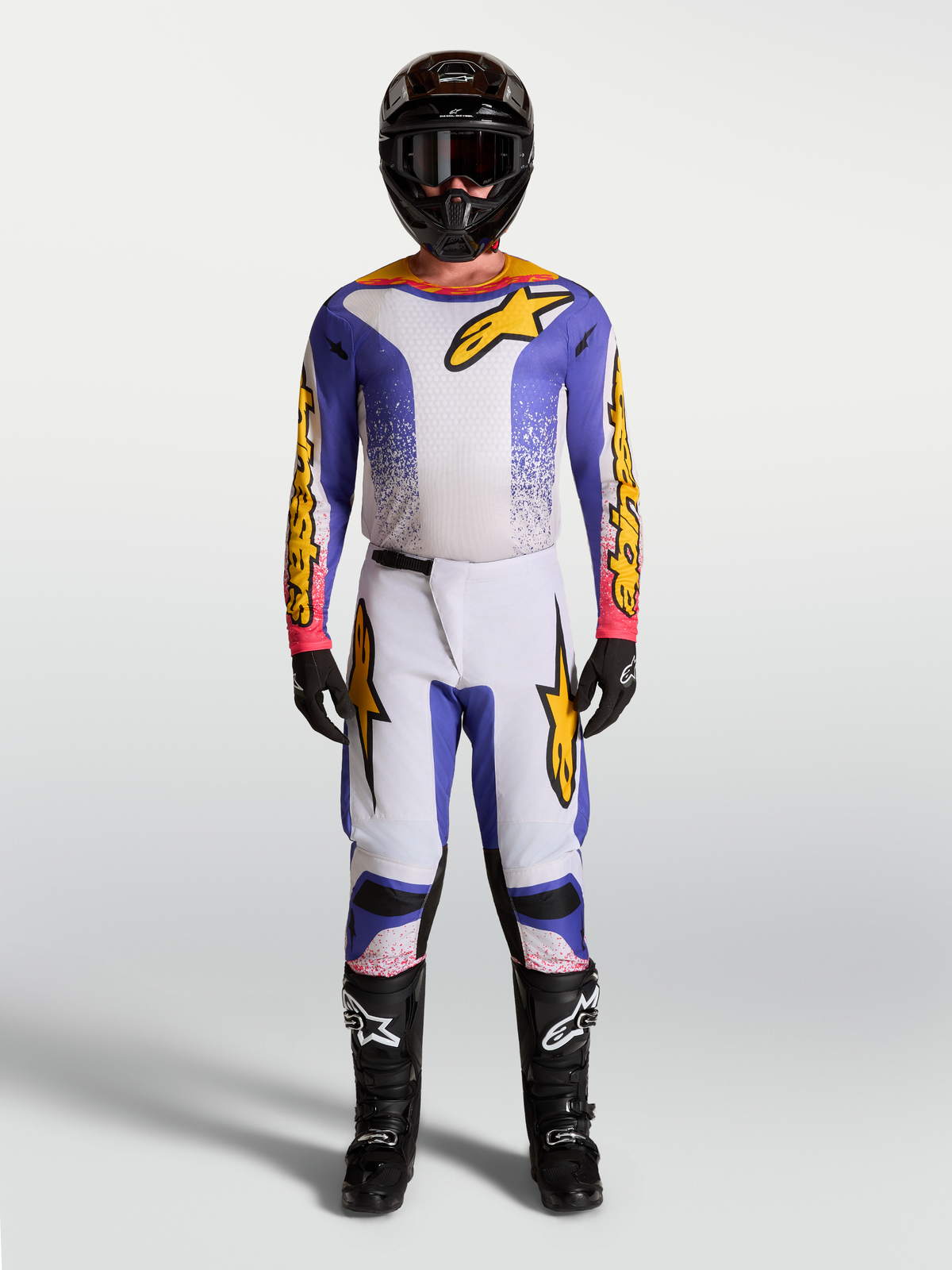 Maillot Fluid Drag et ensemble Fluid Drag Alpinestars, tenue de motocross pour homme, bleu et doré, textile extensible.