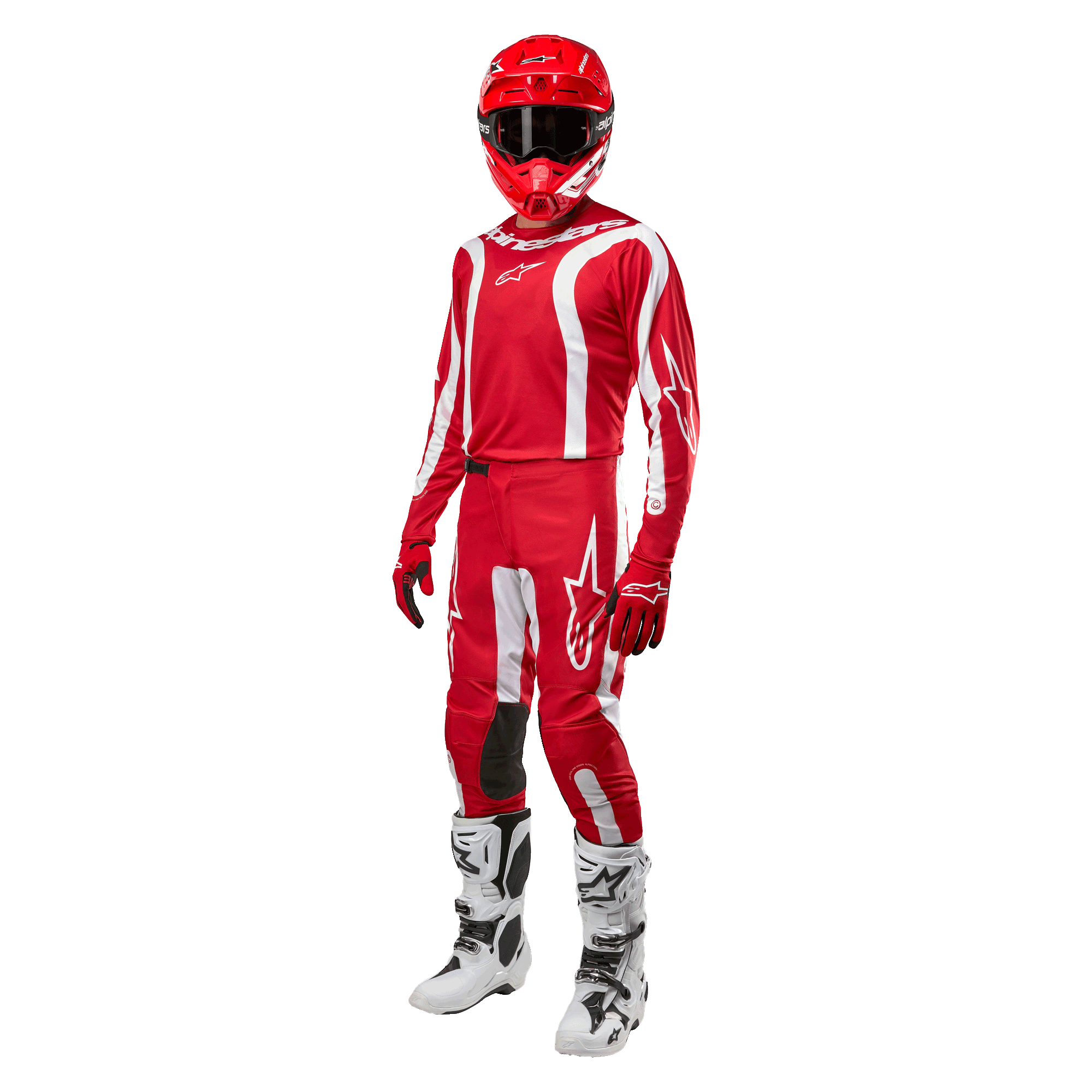 Motocross-Fahrer in kompletter Rennausrüstung, Alpinestars 2024 Fluid Lurv Jersey in Mars-Rot und Weiß, passende rote Hose mit weißen Akzenten, roter Helm, rote Handschuhe und weiß-schwarze Stiefel, abgestimmtes Outfit für den Offroad-Rennsport