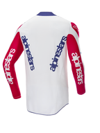 Alpinestars Limited Edition Techstar Fortitude Jersey, Rückansicht, Motocross-Trikot, weißer Hauptteil mit roten Ärmeln und blauem Kragen, mit blauem und weißem Alpinestars-Branding, Hochleistungs-Rennausrüstung