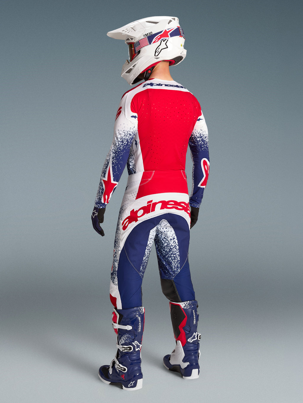 Alpinestars Techstar Unity édition limitée, maillot et pantalons de motocross pour homme, rouges, blancs et bleus, équipement tout-terrain, vue de dos
