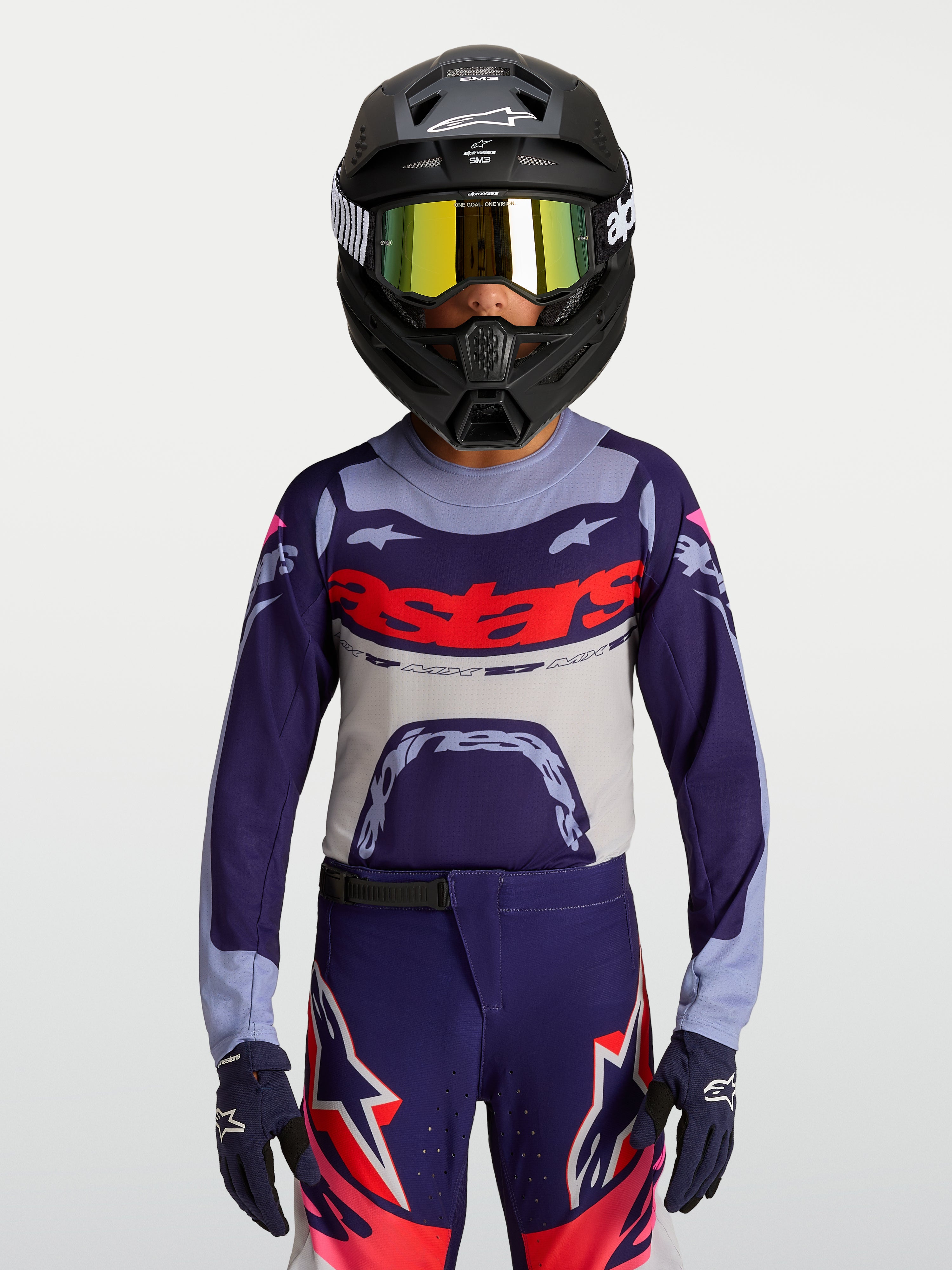 Maillot Alpinestars Supertech Dyna Junior, maillot de motocross violet et gris en maille, coupe athlétique pour jeune pilote.