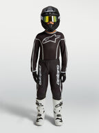 Alpinestars Youth Fluid Apex V2 Jersey and Gear Set, black and silver motocross outfit with white boots.