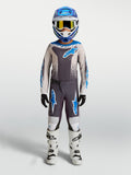 Alpinestars ensemble Fluid Drag Junior 2027, tenue de motocross gris et bleu pour enfant, performance en tout-terrain.