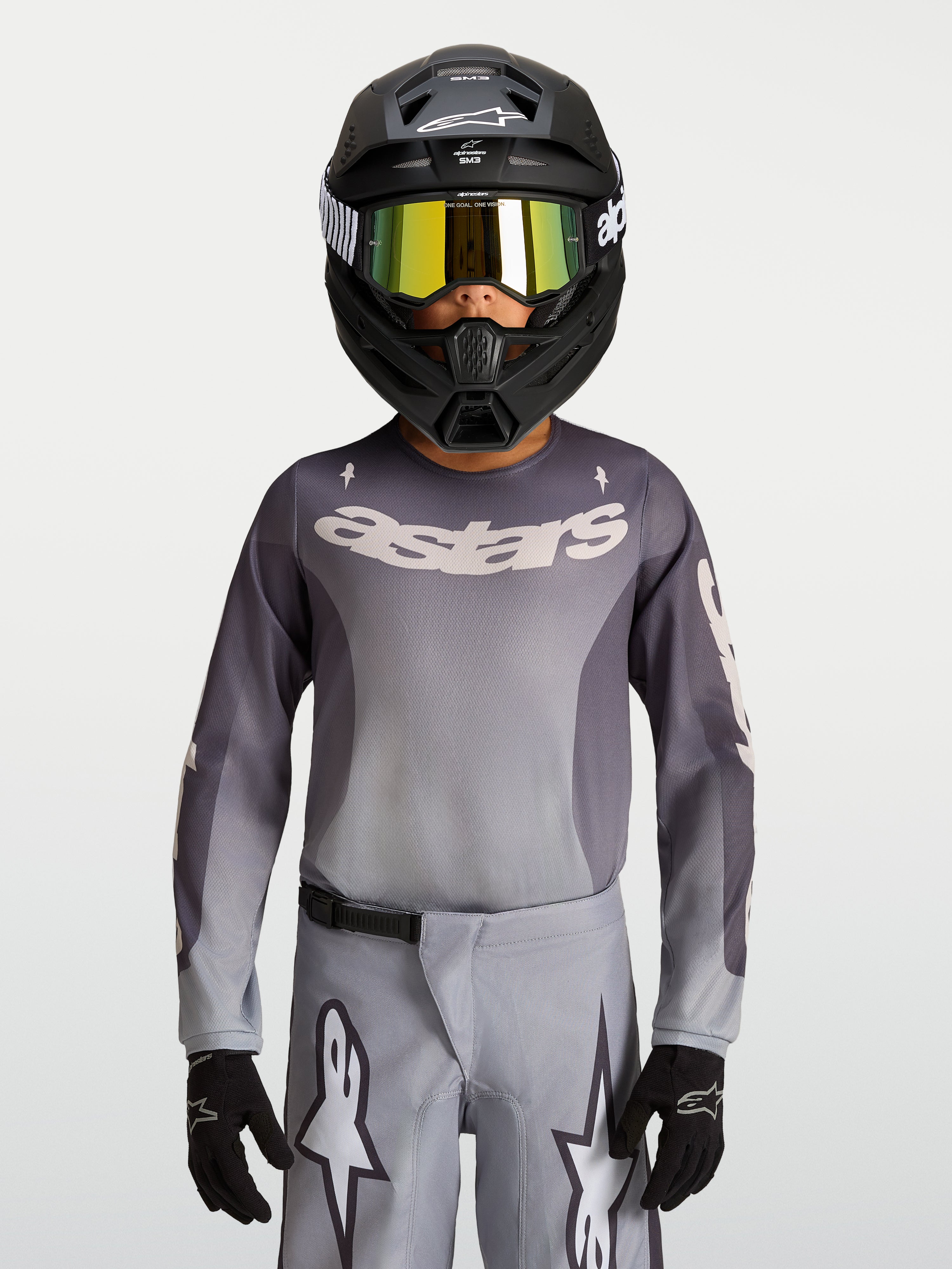 Alpinestars maillot Fluid Amber Junior, maillot de motocross gris et sable respirant pour le tout-terrain.