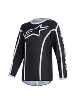 Alpinestars 2026 Youth Fluid Apex Jersey, motocross jersey, zwart en grijs, met een groot wit A-star logo op de borst, witte biezen en een sportkraag, lange mouwen performance-kleding voor jeugd off-road rijden
