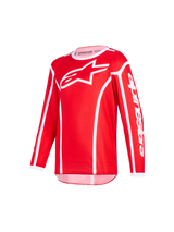 Maillot Alpinestars 2026 Youth Fluid Apex, rouge et blanc, maillot de motocross à manches longues avec logo Alpinestars blanc sur la poitrine et lettrage sur la manche, coupe athlétique, poly-tissu évacuant l'humidité pour le tout-terrain