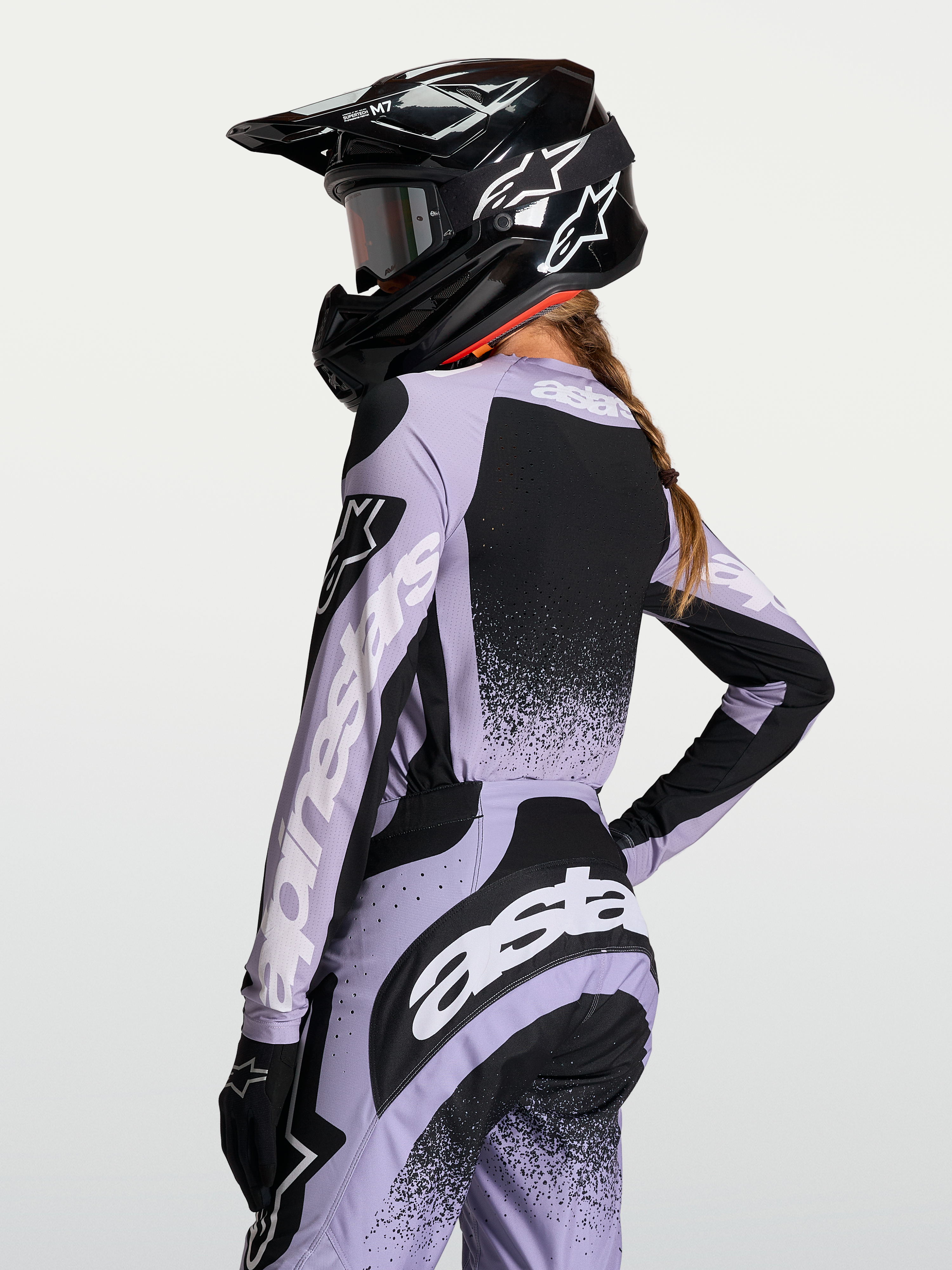 Alpinestars Stella Techstar Swan jersey, ademende dames-motocross racing top, lichtpaars en zwart, race-pasvorm.