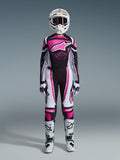 Alpinestars 2026 Woman Stella Techstar Nomur Gear Set, full motocross racing outfit in Black White and Fuchsia, jersey featuring a large star logo and pink splash design, matching pants, white helmet with goggles, black and white boots, coordinated women's off-road gear
