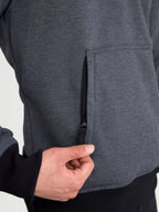 Alpinestars Ageless Hoodie, men's urban motorcycle hoodie in asphalt melange gray, close-up view highlighting the hidden zippered hand pocket on the side