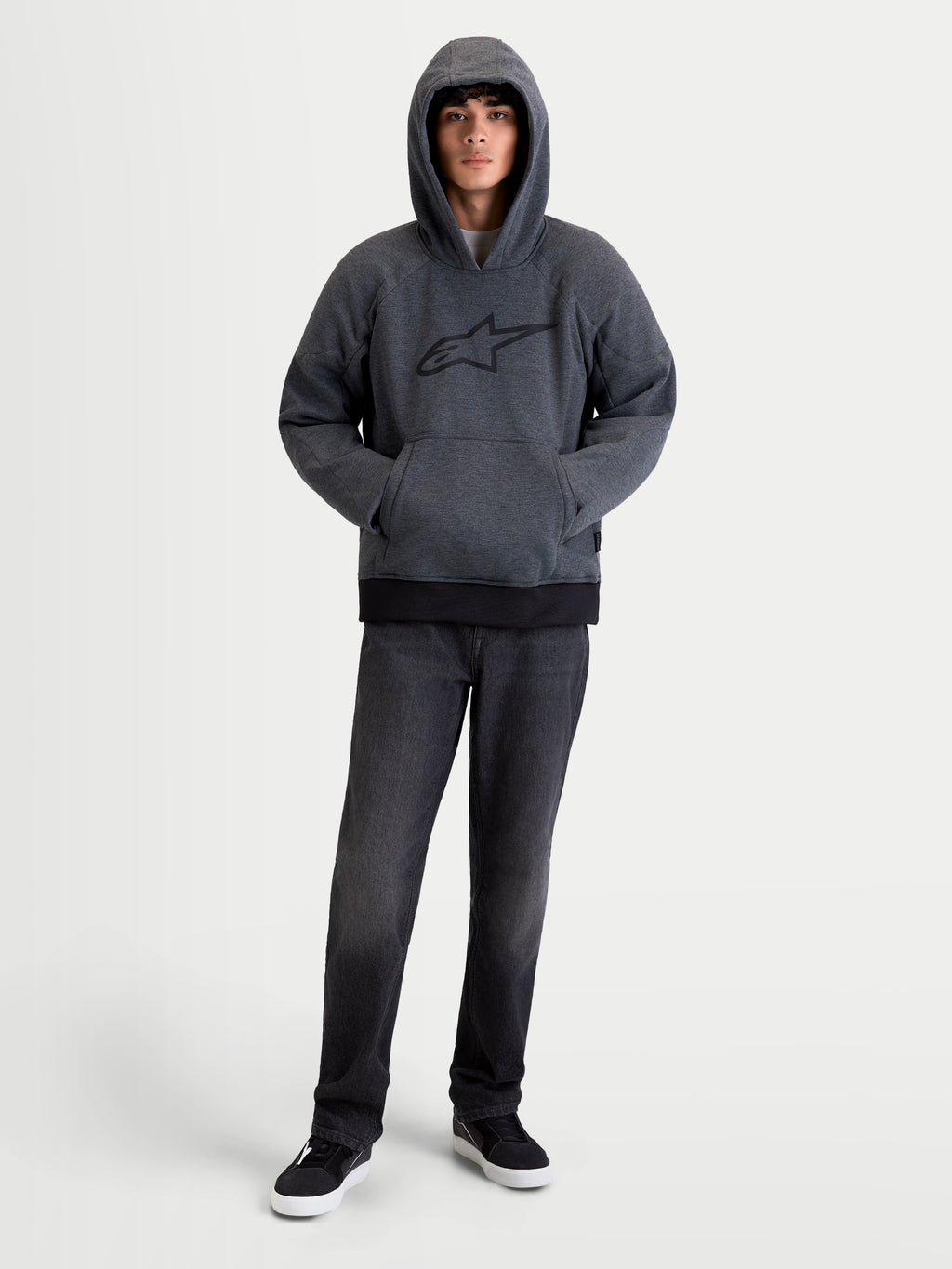 Alpinestars Ageless Hoodie, men's urban motorcycle hoodie jacket in asphalt melange gray, front view on a model wearing the hood up, featuring integrated Nucleon shoulder and elbow armor and front pouch pocket
