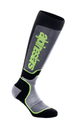 Chaussettes Alpinestars MX Plus, chaussettes hautes de motocross, noir, gris et jaune fluo, avec marquage Alpinestars vertical, textures nervurées et en maille, équipement technique de performance