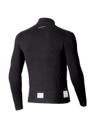 Haut à manches longues Alpinestars ZX Evo V3, sous-vêtement technique de course automobile noir, vue de dos avec un petit logo gris sur la nuque et des étiquettes de certification FIA/SFI blanches sur l'ourlet inférieur, conception légère et résistante aux flammes.